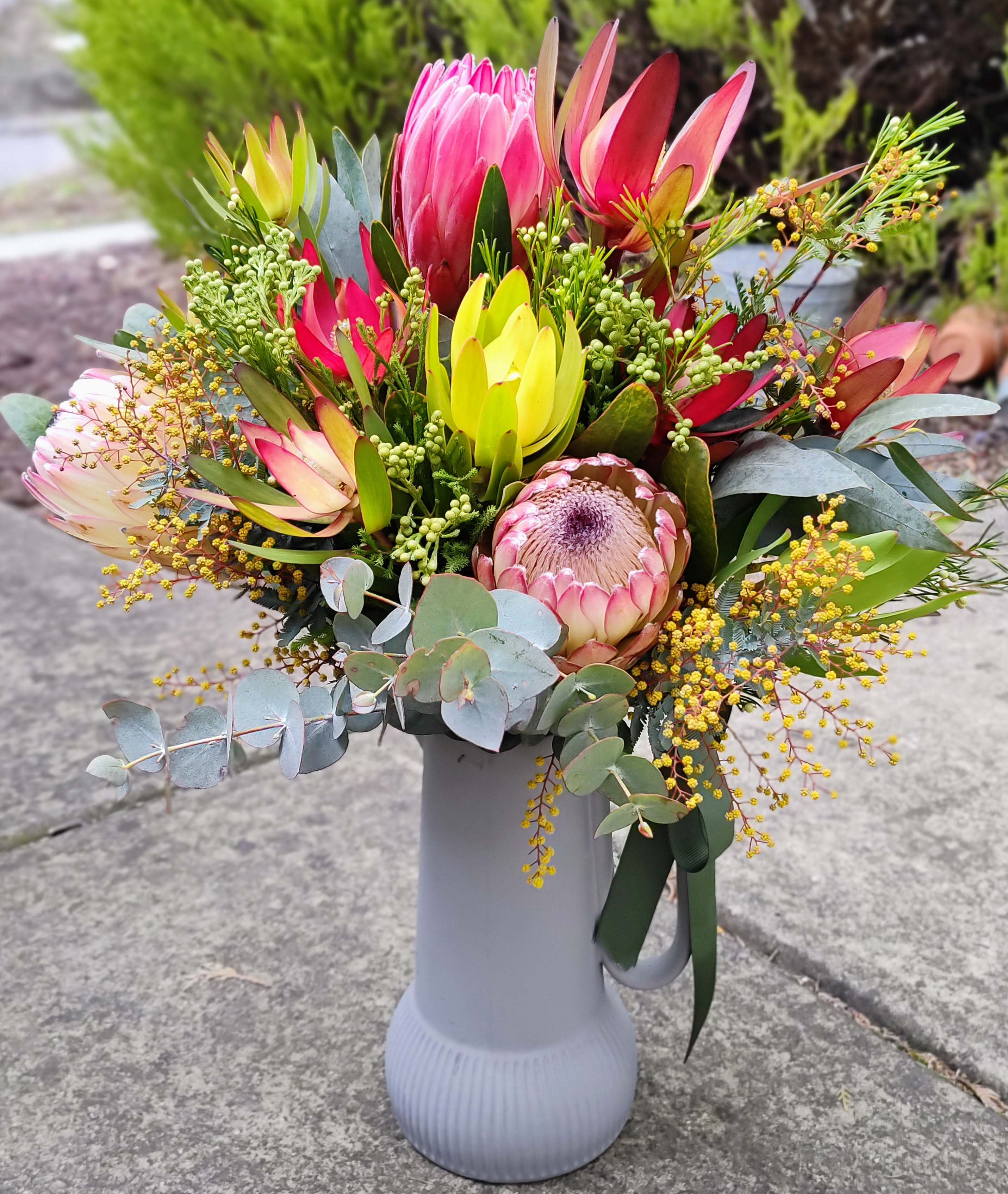 Robbie - Native Wild Flowers Arrangement in a Robert Gordon Cashmere Poet's Dream Jug