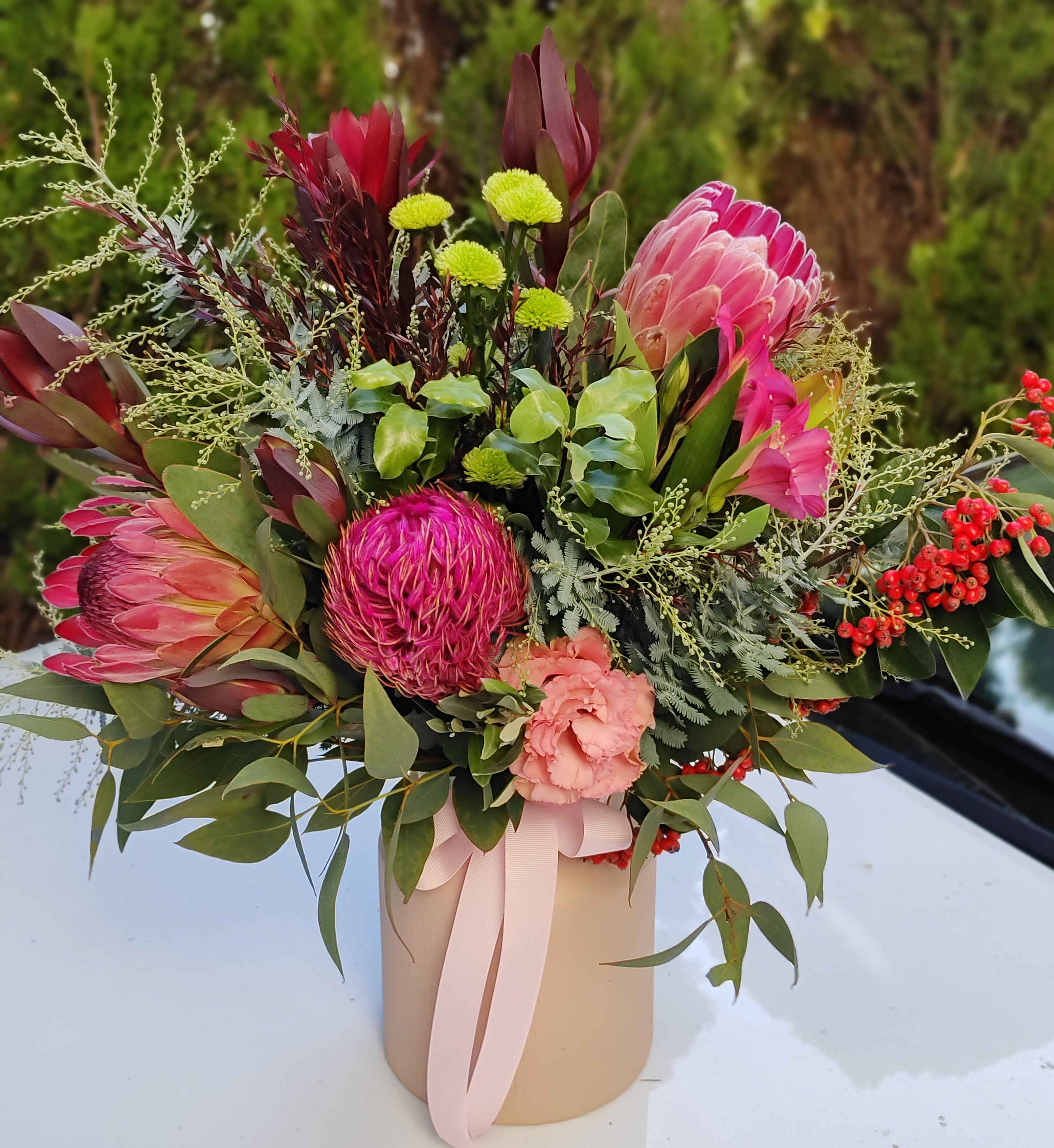 Robbie - Native Wild Flowers Arrangement in a blush ceramic vase