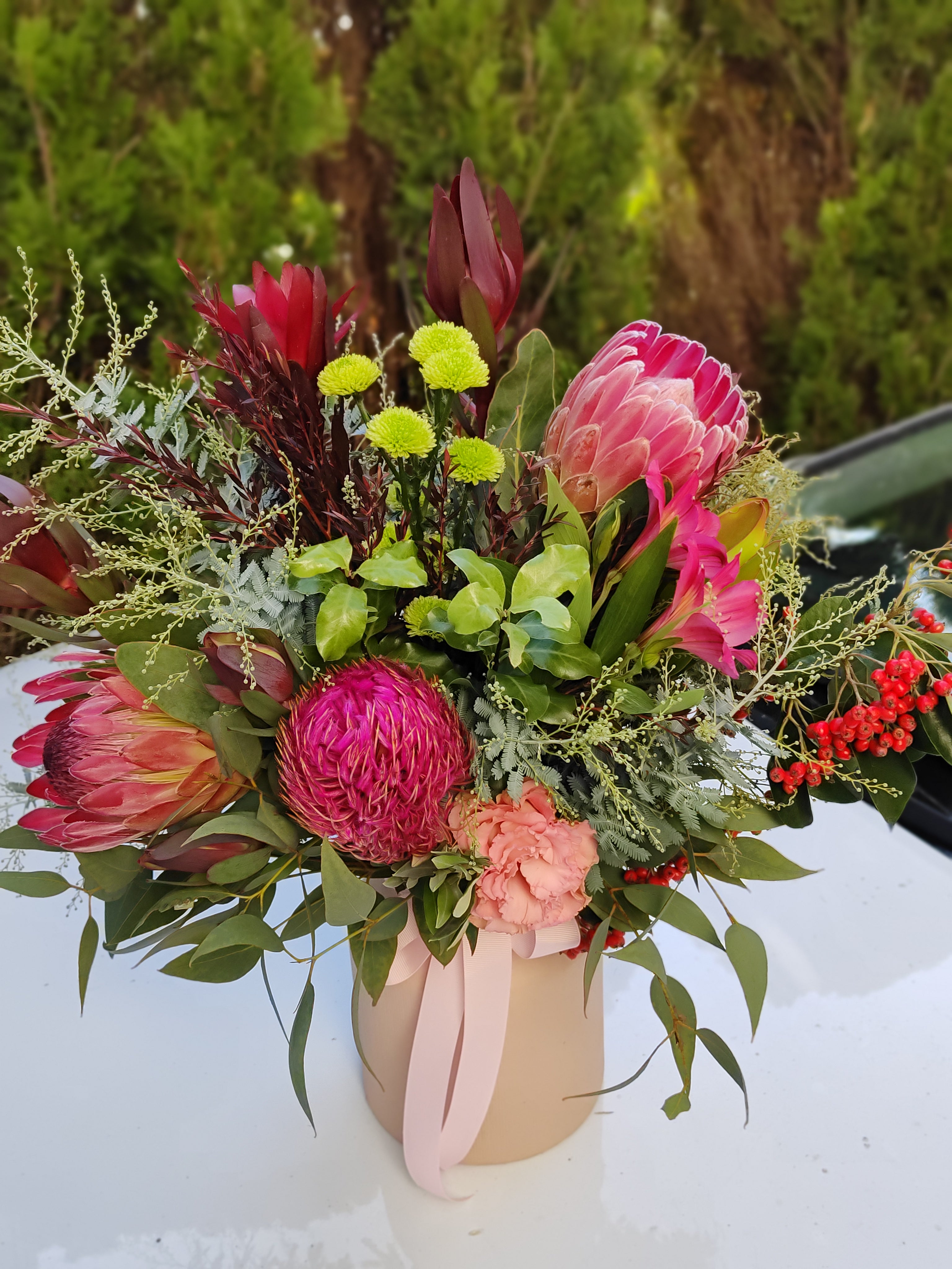 Robbie - Native Wild Flowers Arrangement in a blush ceramic vase