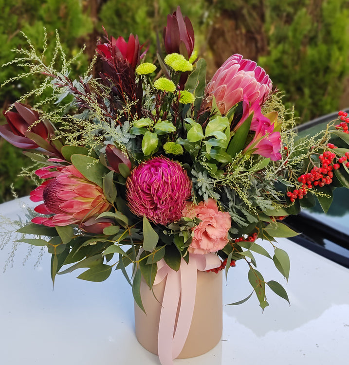 Robbie - Native Wild Flowers Arrangement in a blush ceramic vase